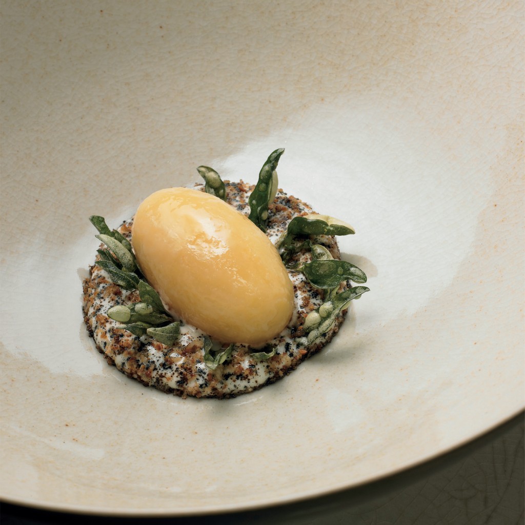 A Simple Dish of Potato Cooked in the Earth it was Grown from