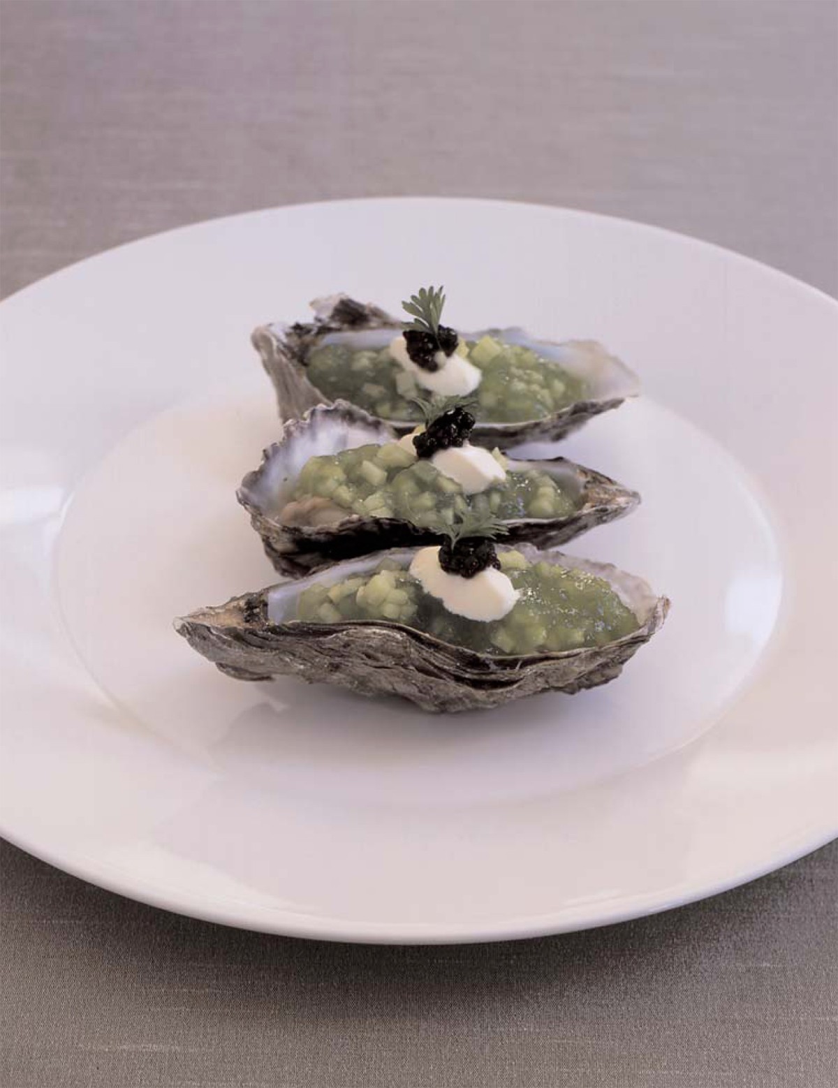 Oysters with Cucumber Jelly, Sour Cream and Caviar from Season to Taste by Liam Tomlin