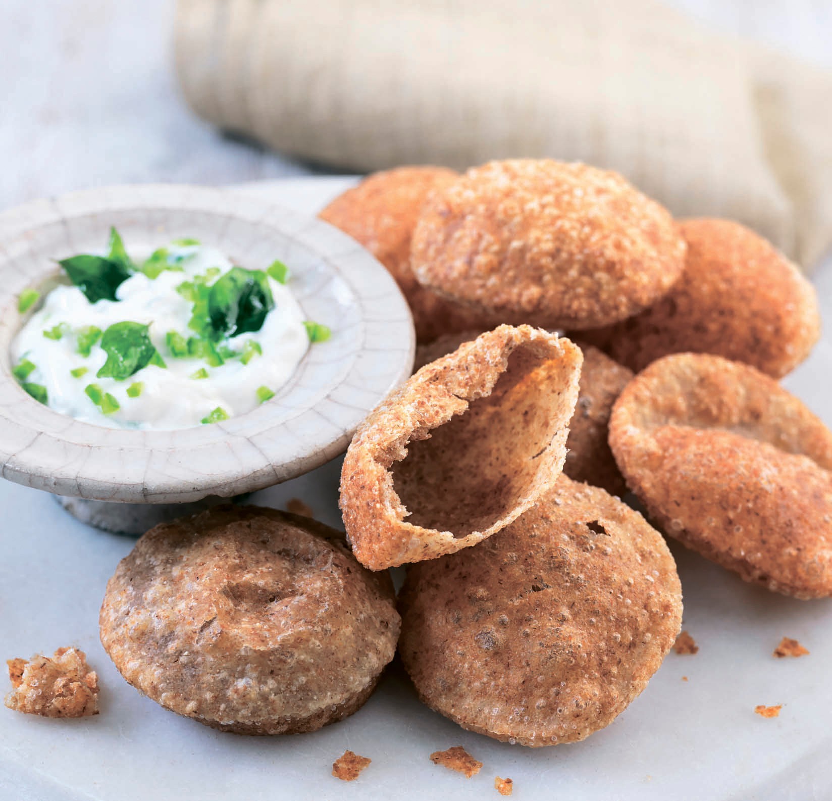 Goan puffed bread from The Complete Indian Regional Cookbook 300