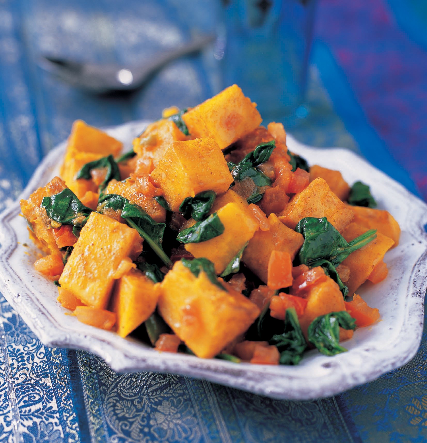 Golden yam cubes with spinach from The Complete Indian Regional Cookbook 300 Classic Recipes
