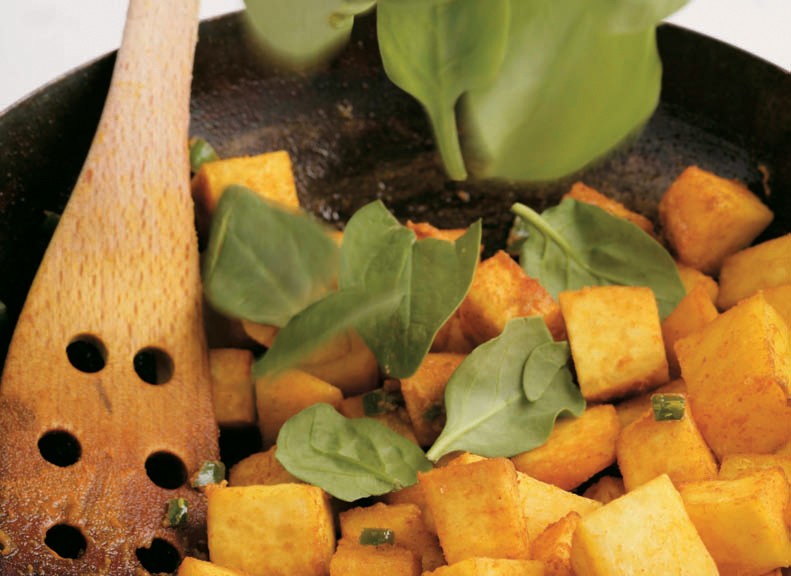 Golden yam cubes with spinach from The Complete Indian Regional Cookbook 300 Classic Recipes